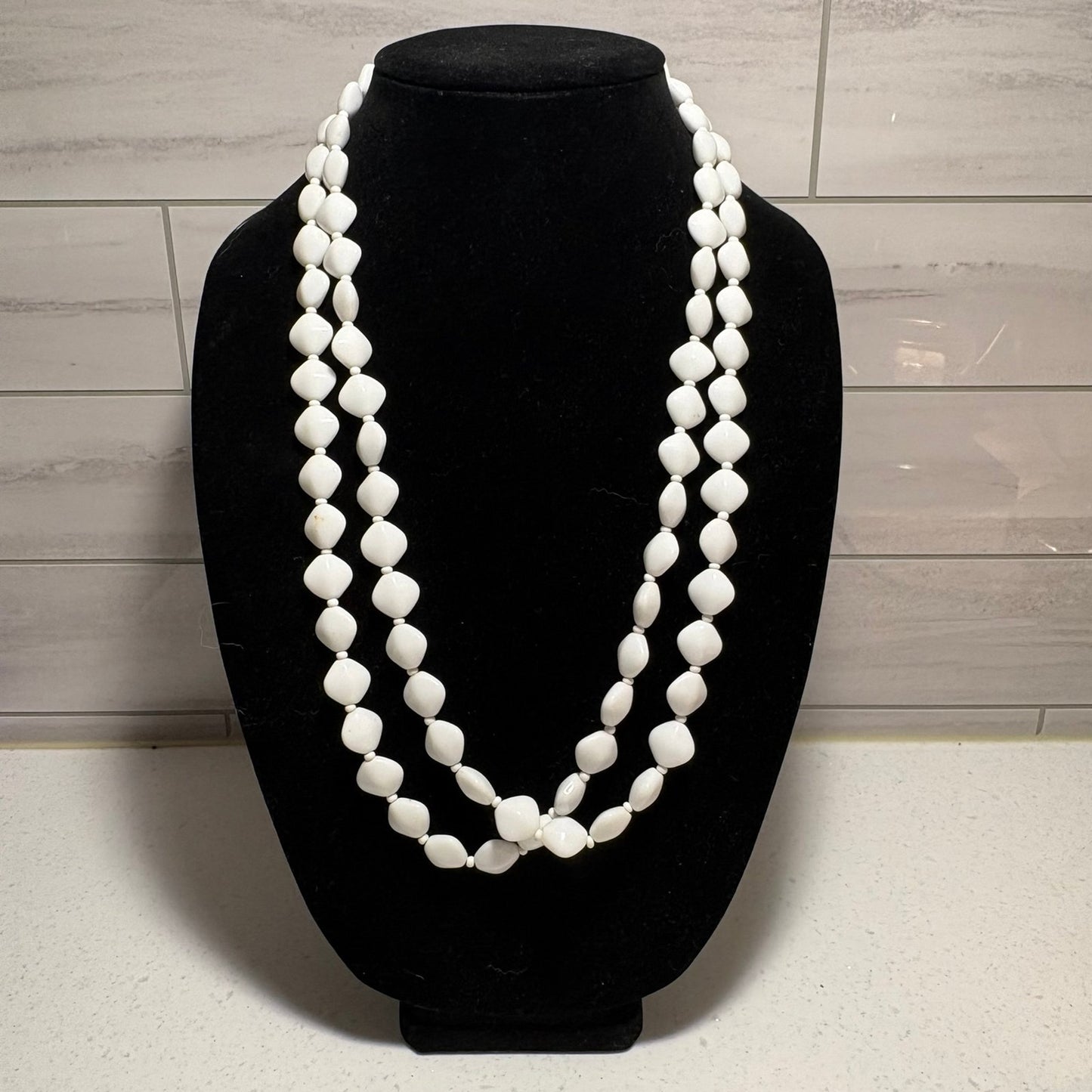 White bead necklace