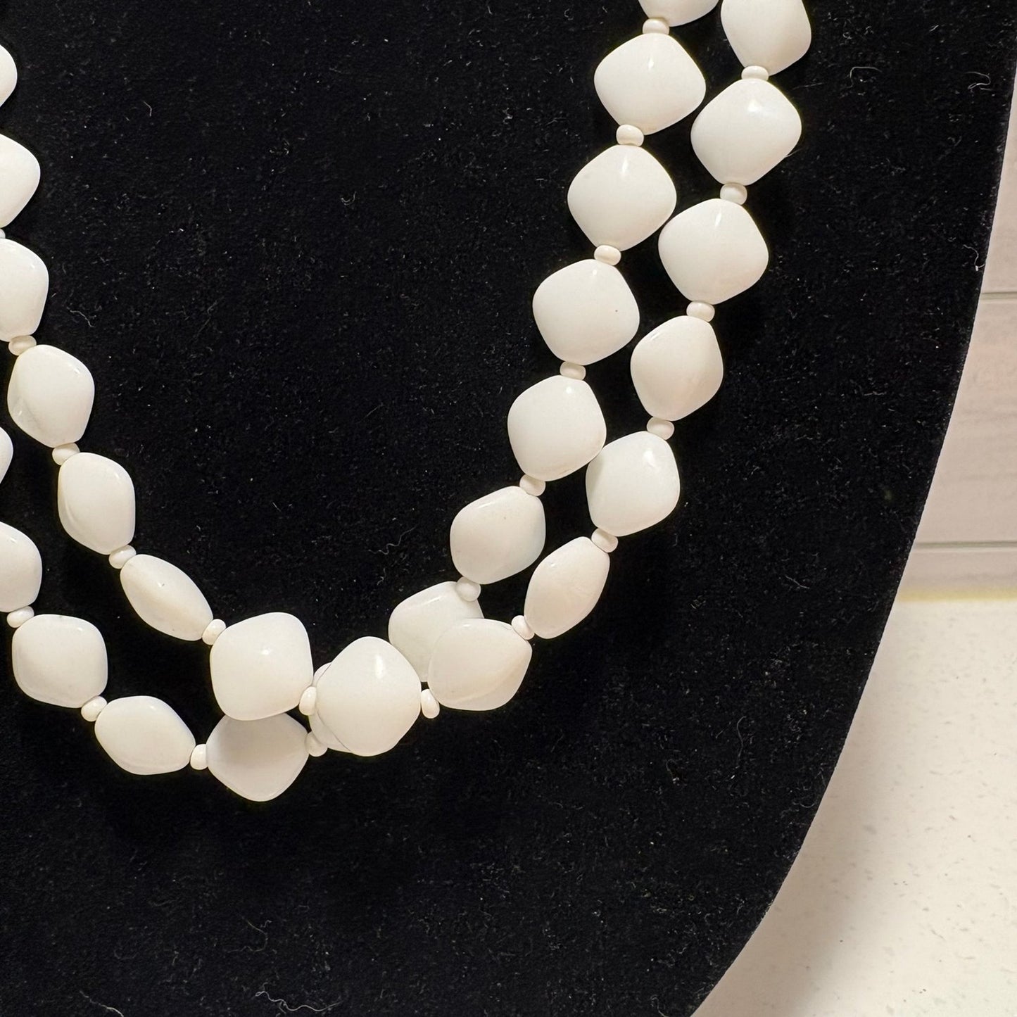 White bead necklace